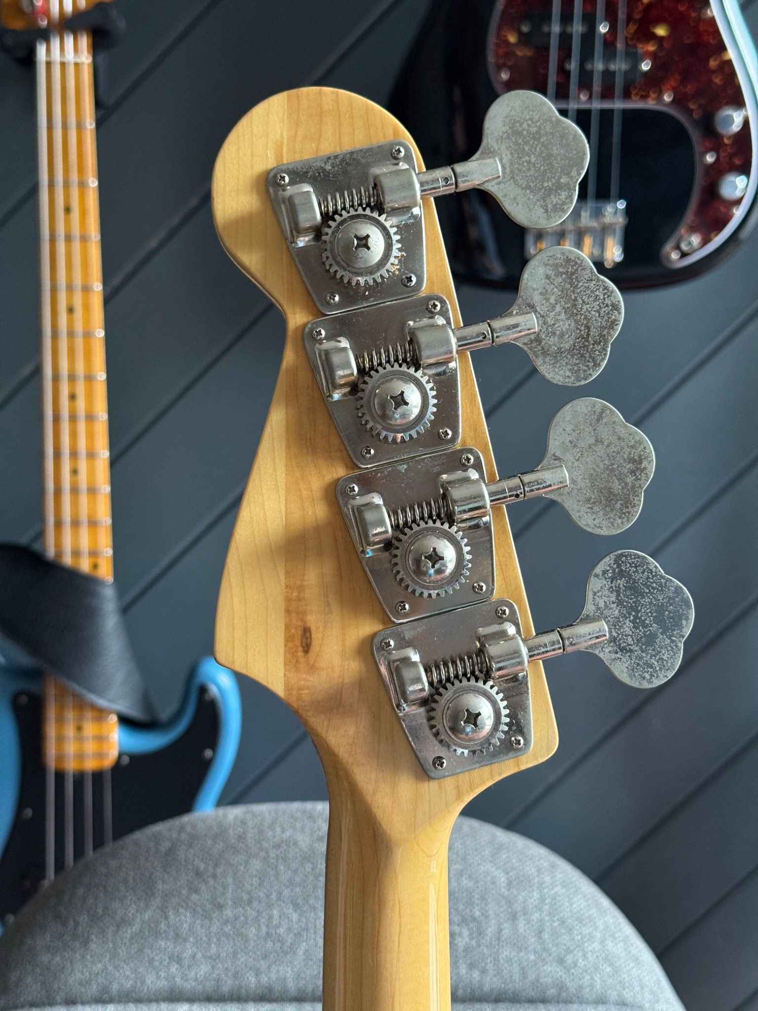 Rear of the headstock and tuner hardware.