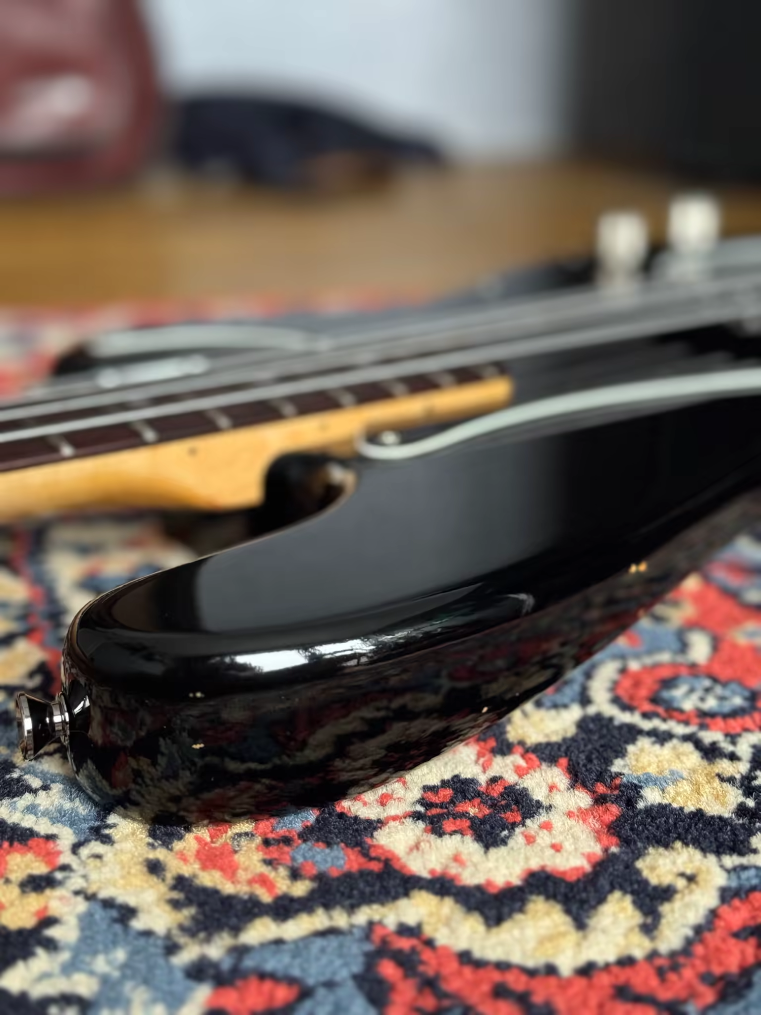 Small chips and finish wear along the black body edge