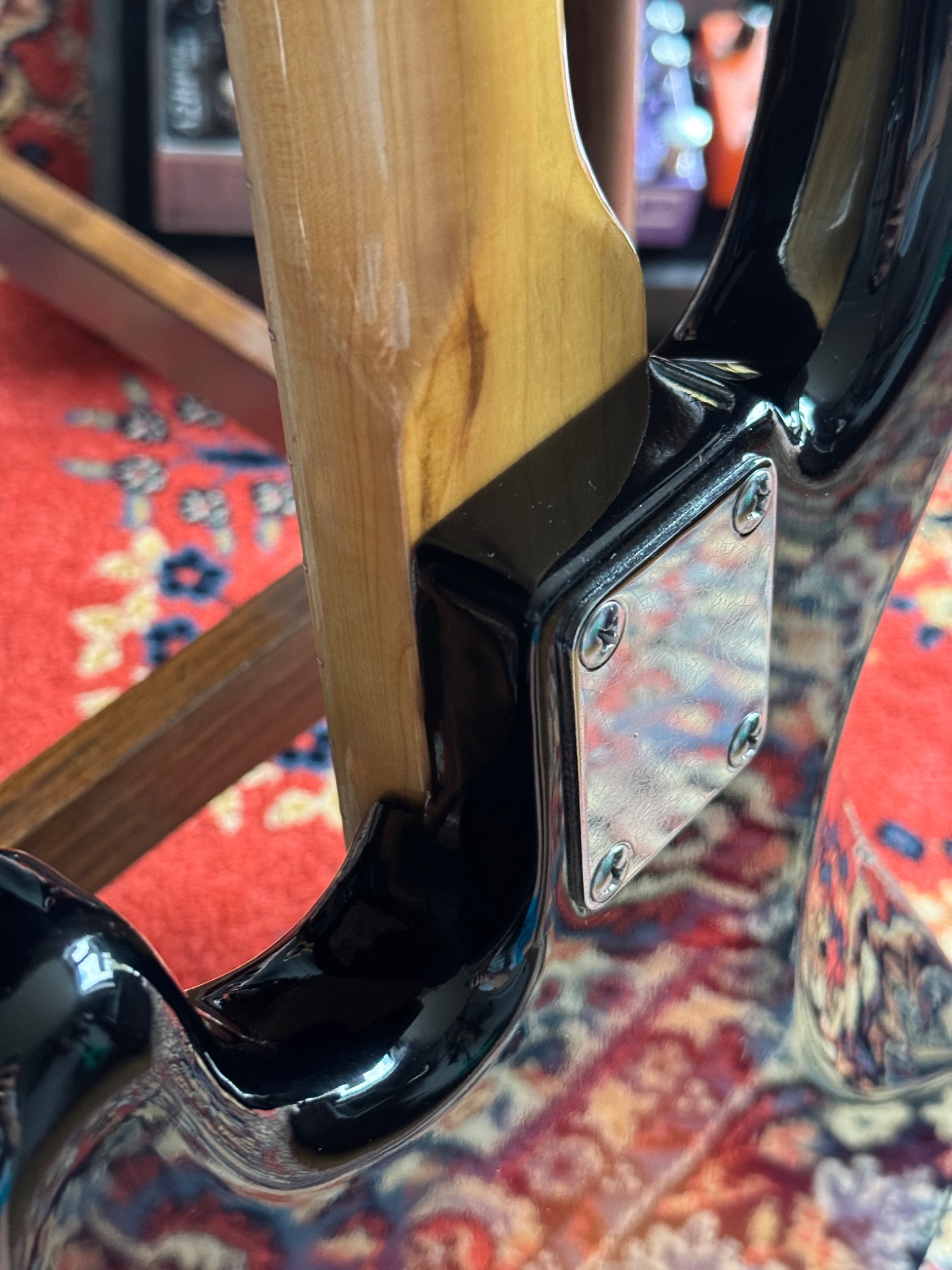 Rear neck joint and metal plate.