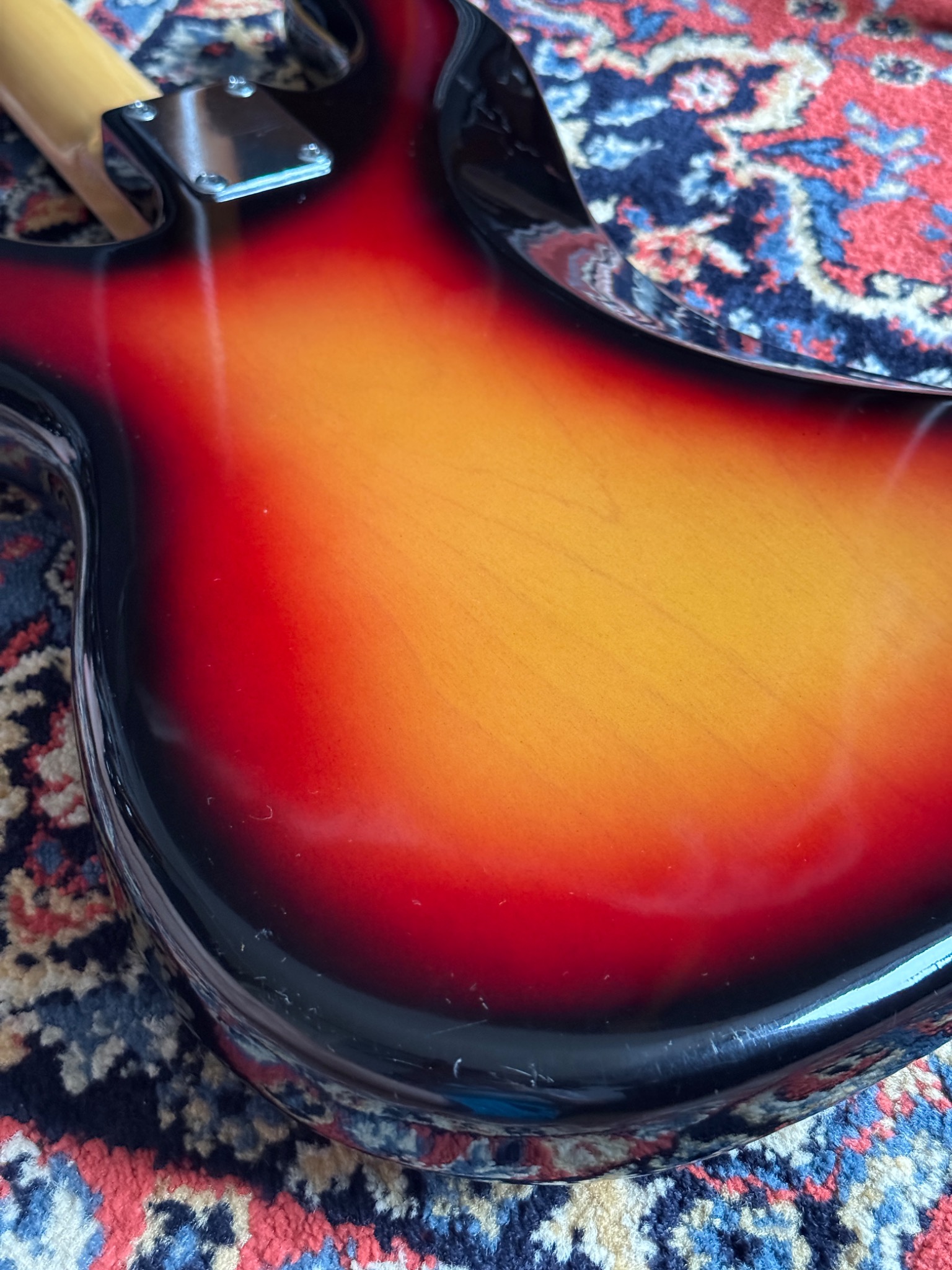 Fine scratches and small marks in the Orange OP-500 sunburst finish