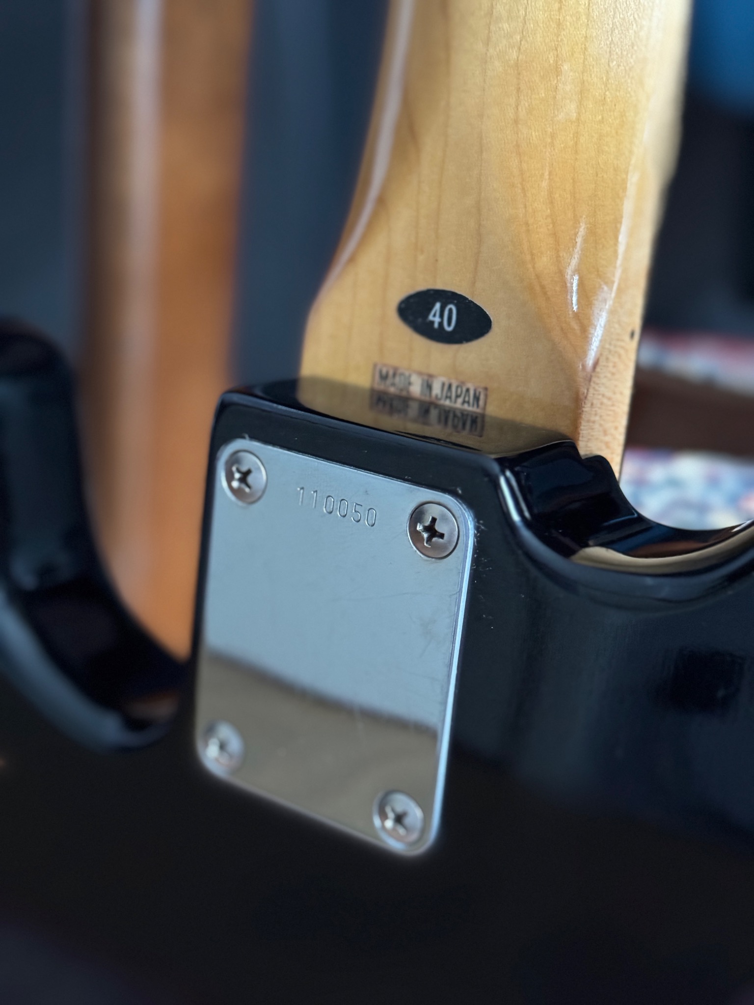 Neck plate with stamped marking