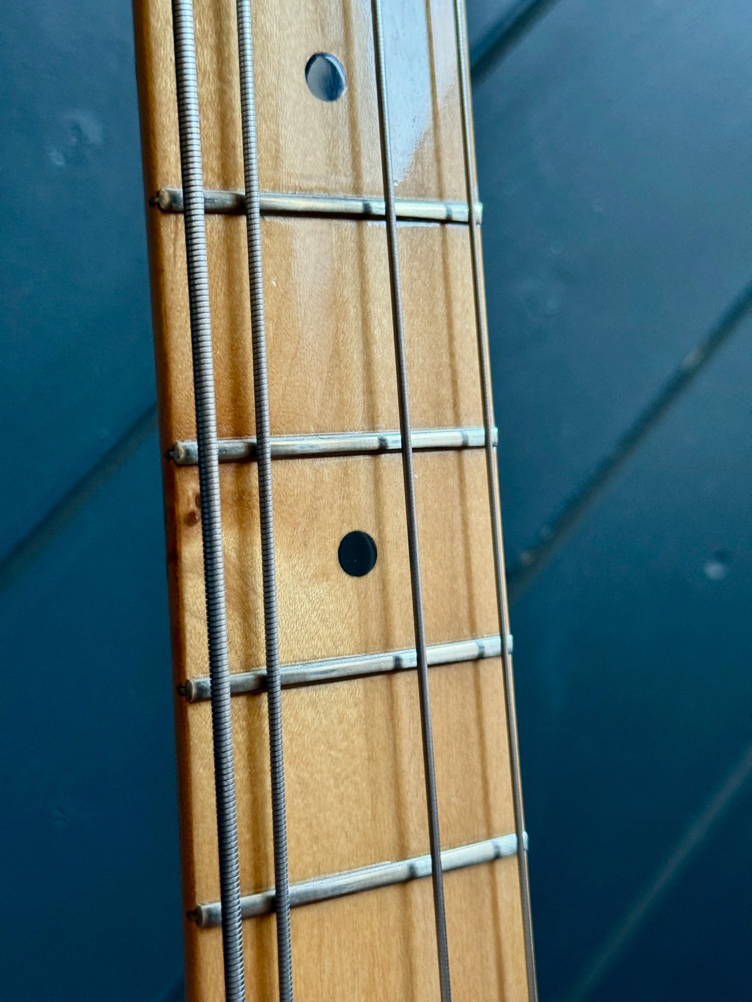 Maple fingerboard and fret detail.