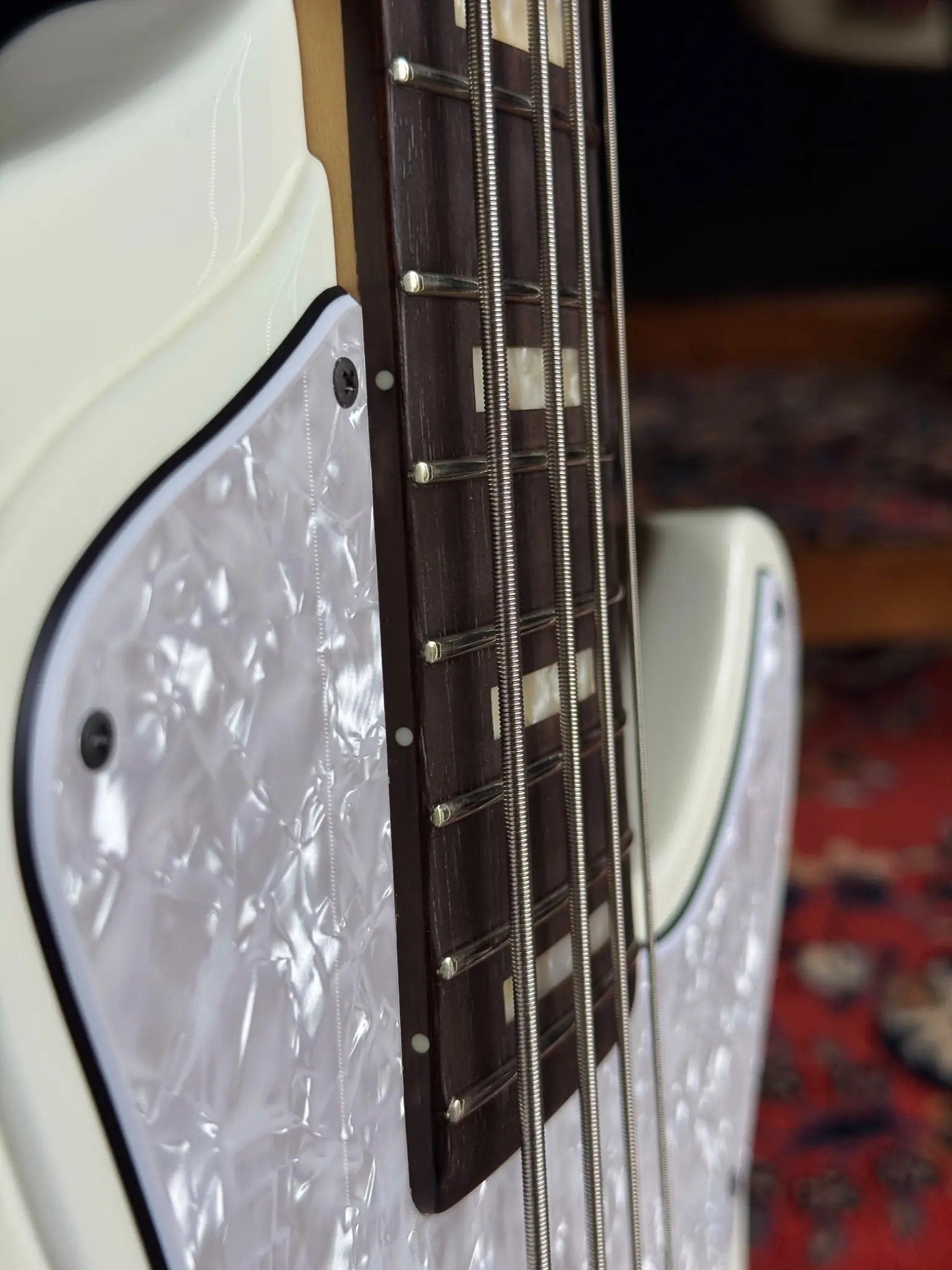 Rosewood fingerboard at the body end
