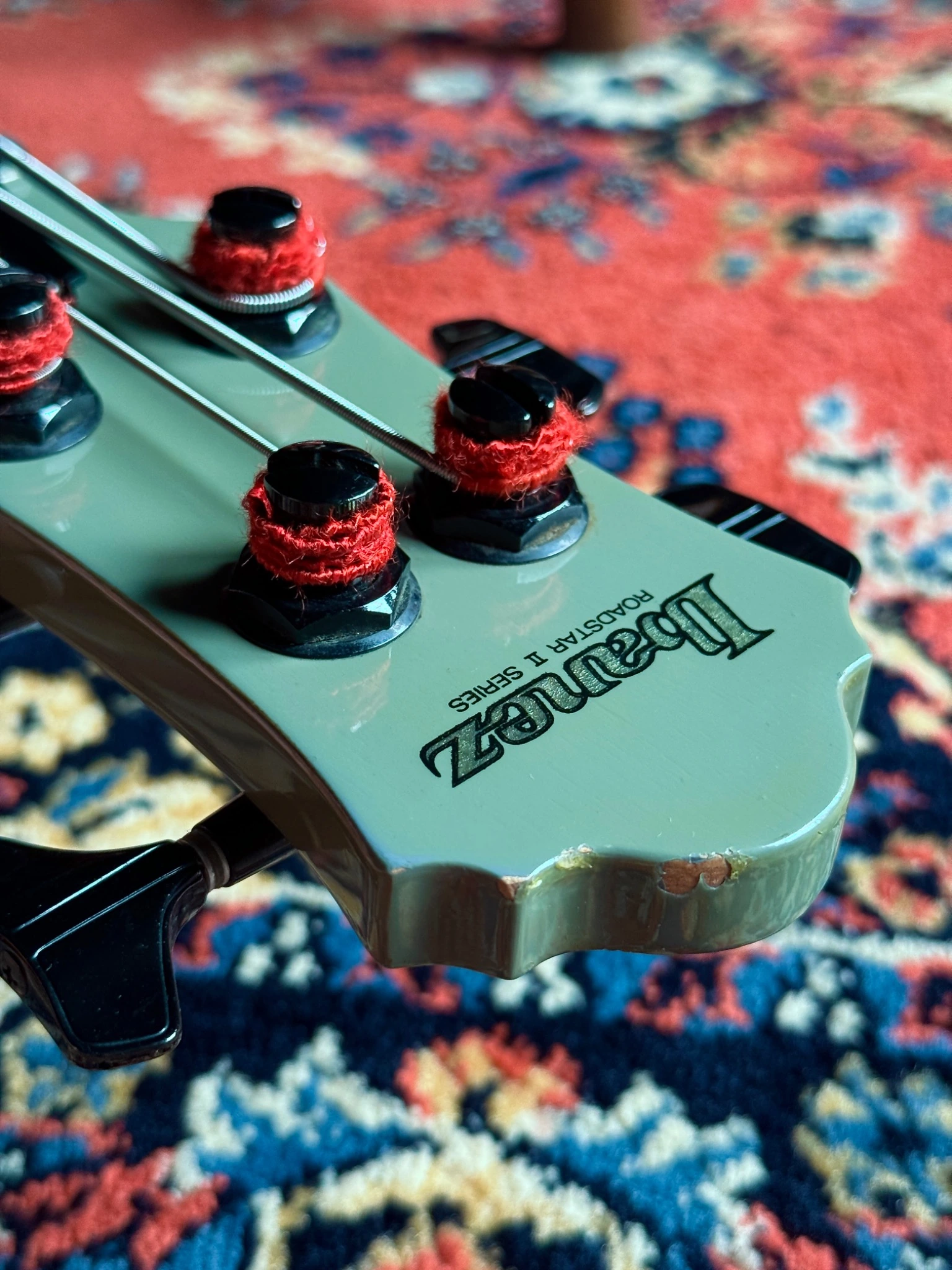 Close view of the Ibanez headstock finish and tuner area