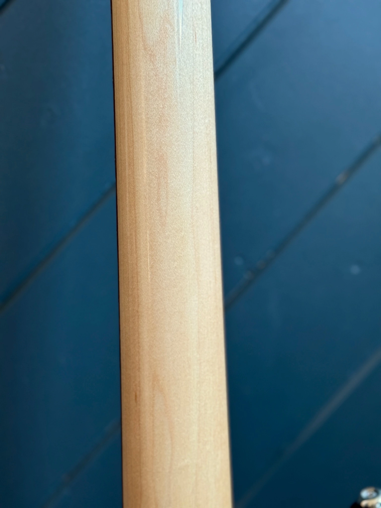The back of the maple neck, shown toward the heel.