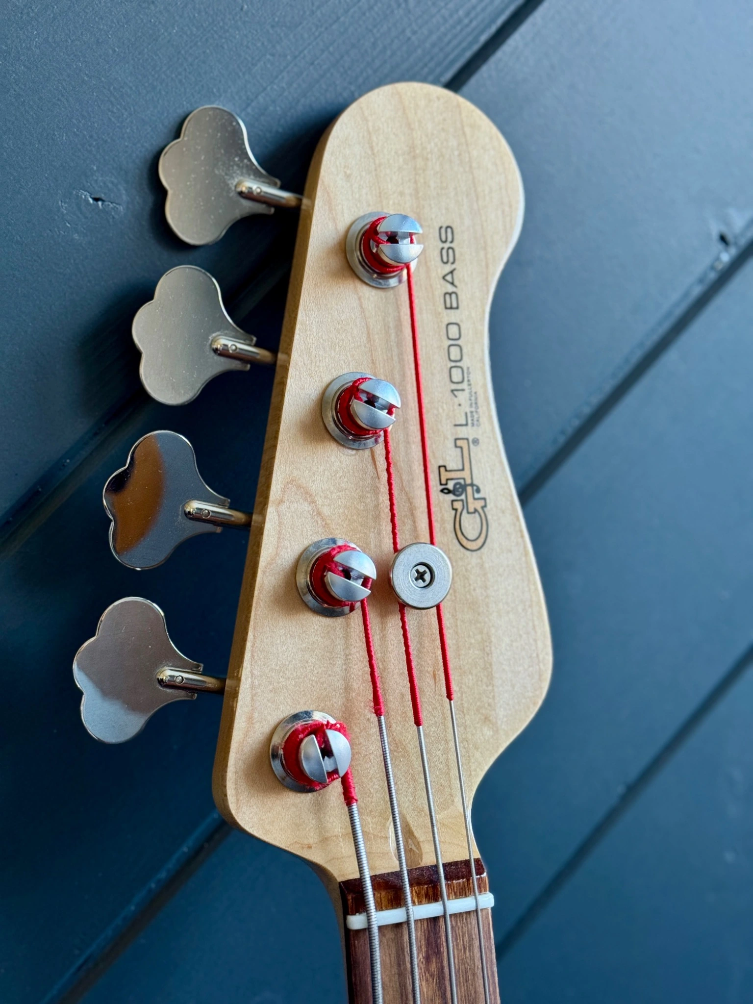 Front of the G&L headstock, with logo and tuners.