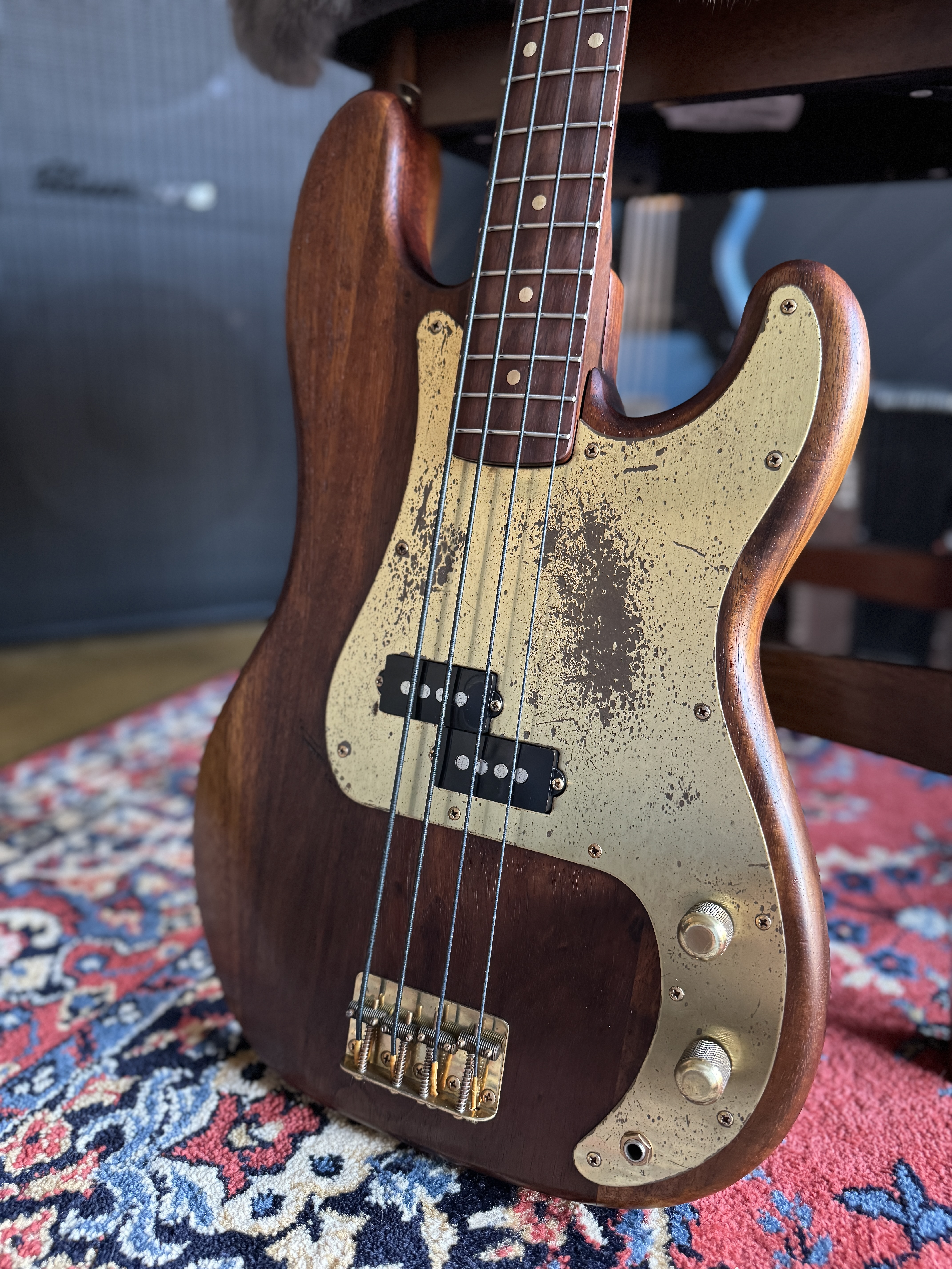 Front body and brass hardware of the Greco Precision-style bass