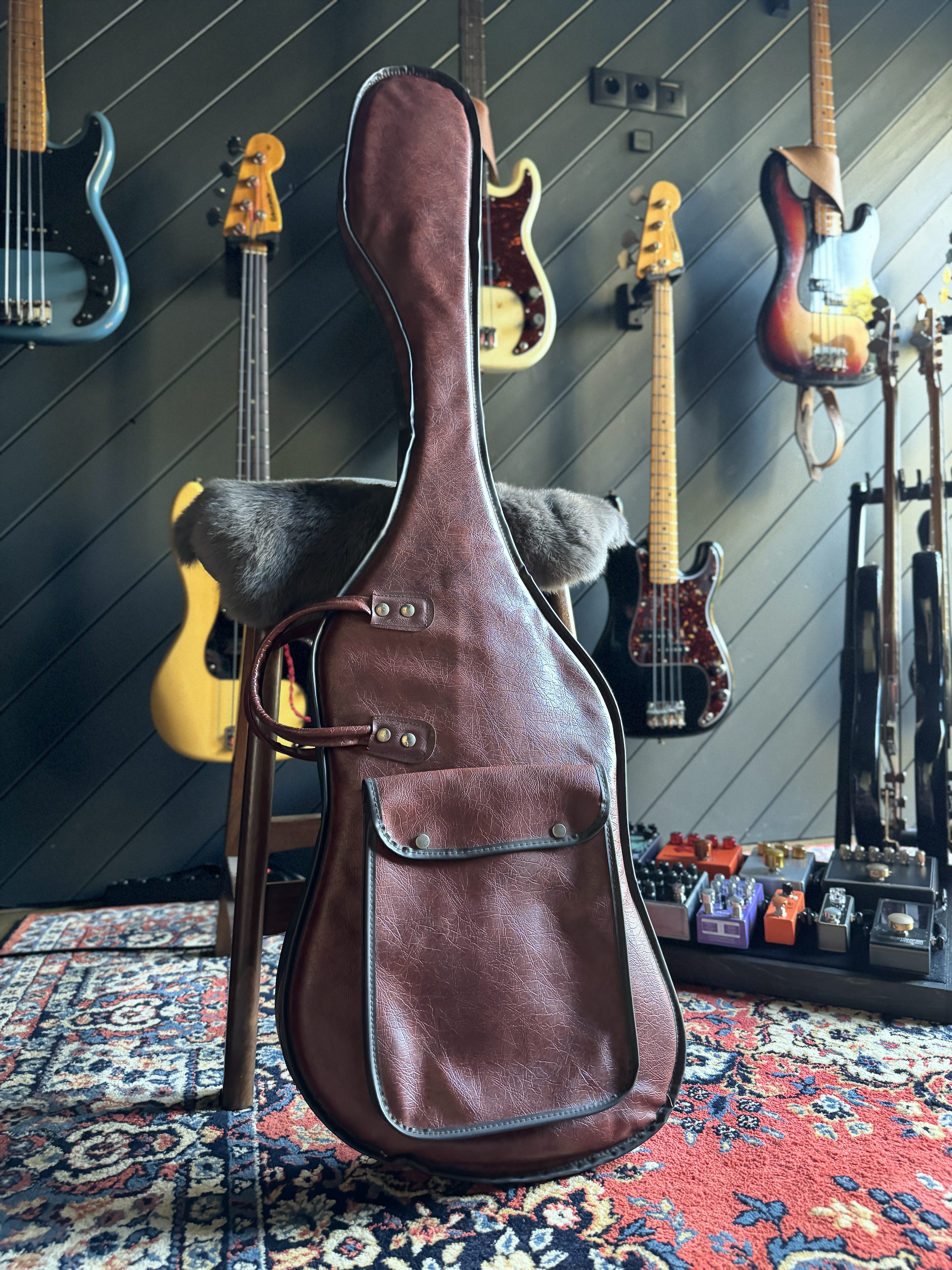 Brown vintage gig bag, front